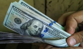 تباين أسعار صرف الدولار بين بغداد وأربيل
